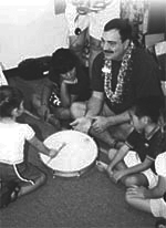 Hawaiian kids and teacher at music lesson